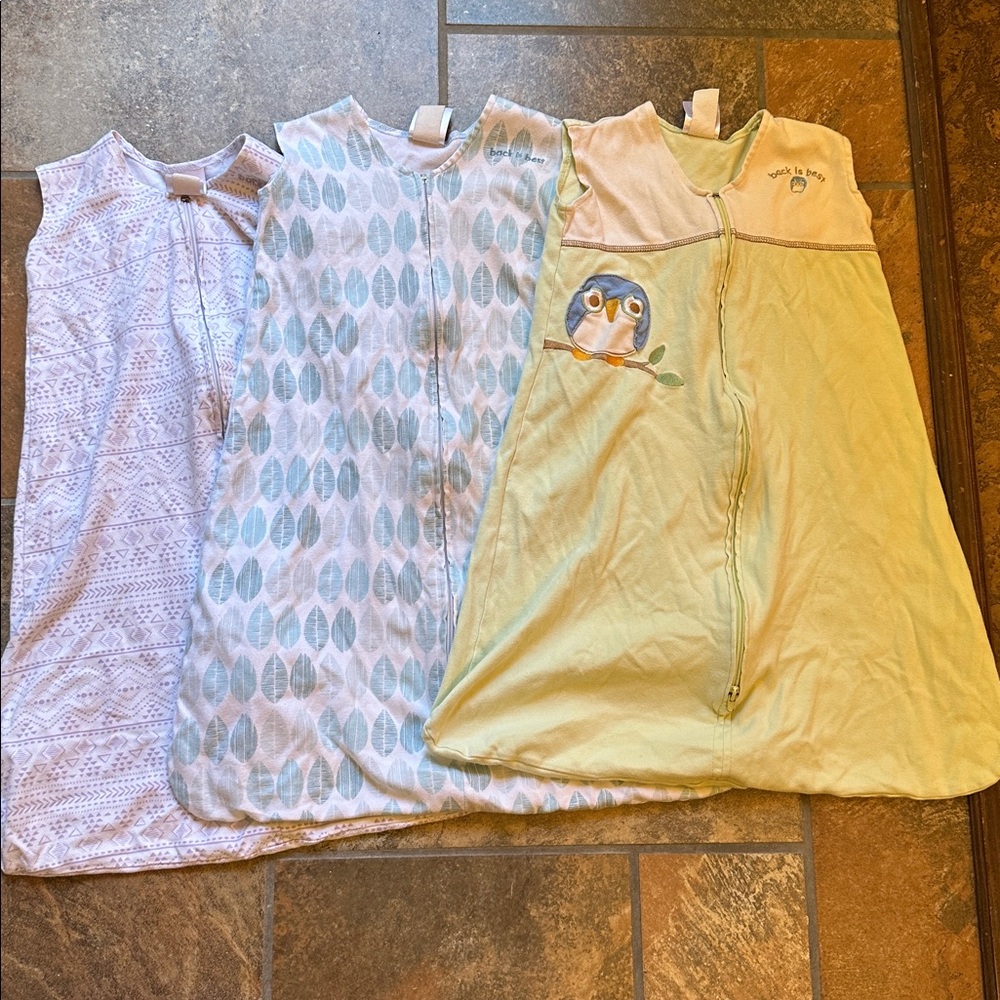 Three Halo brand sleep sacks. Size medium.